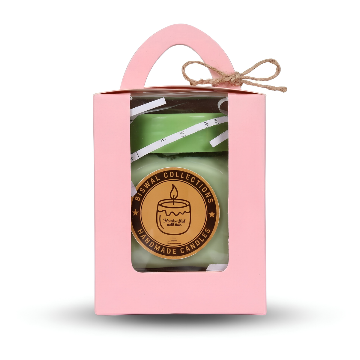 Sage green handmade candle in a glass jar with white lid, lit