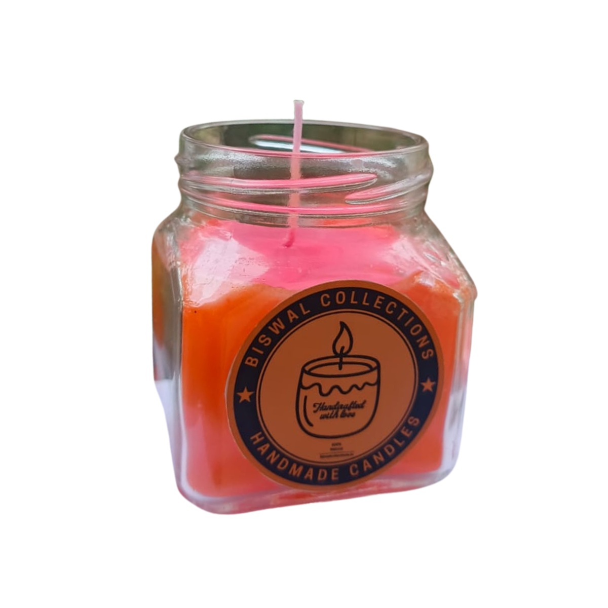 Hand holding the pink candle gift box with jute bow